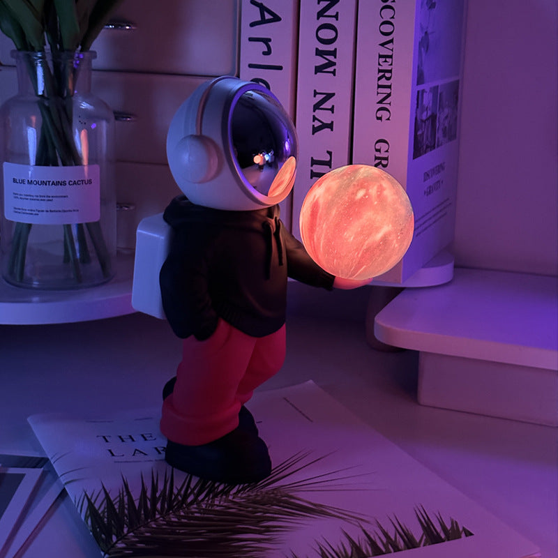 NNEDSZ Holding the dreamy starry sky (black top + red pants) Creative Astronaut Bluetooth Speaker with 3D Starry Sky Lighting, Portable Wireless Moon Lamp Speaker - Perfect Gift for Space Enthusiasts-0